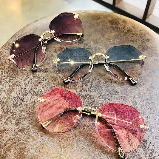 Polygonal Eyewear Women Rimless Trimmed Sunglasses